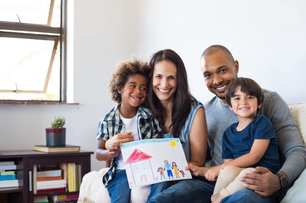 Multiethnic family on sofa